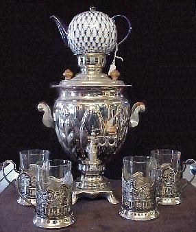 Silver Samovar with silver and glass tea cups