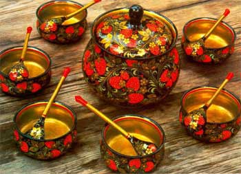 Russian Decorated Timber (Khokhloma) set consisting of bowls, spoons and a pot